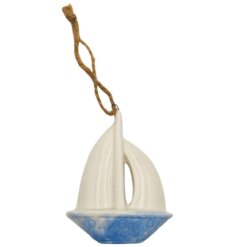 Add a charming coastal touch with this 8.5cm ceramic hanging boat