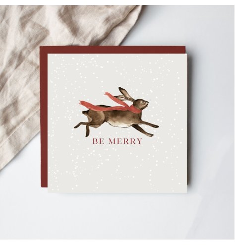 Share holiday joy with our festive red and white "Be Merry" Christmas greeting card.