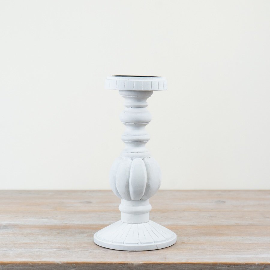 Stylish candle holder featuring durable wood and iron with a lovely whitewashed look.