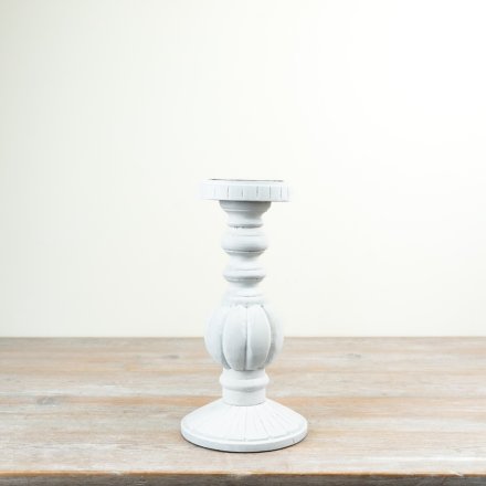 a stylish candle holder in wood and iron 