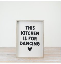 Bring charm to your kitchen with the delightful "Kitchen Dancing" wooden sign.