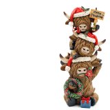 charming highland cow stack with merry christmas sign 