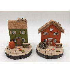 Bring warm autumn charm to your space with this lovely wooden house decor piece.