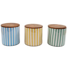 A sleek and stylish striped storage jar to keep your space organized.