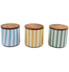 A delightful set of striped storage jars for stylish organization.