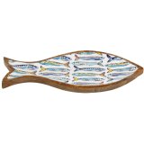 A rustic wooden tray in the shape of a sardine topped with an enamel print of colourful sardines.