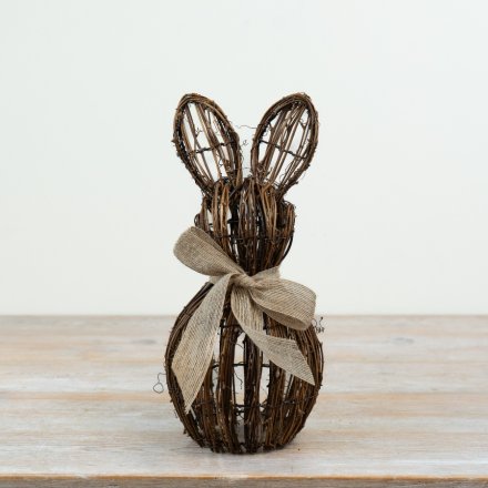 Sweet rattan bunny decor made from natural brown wicker, adding rustic charm to any space.