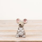 a charming smiley faces mouse ornamnet 
