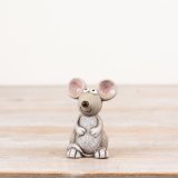 a small mouse decoration 