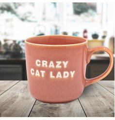 Add fun to your tea or coffee time with the Crazy Cat Lady Pink Mug!