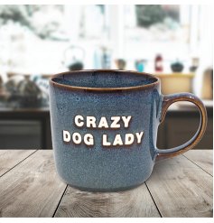 Celebrate your dog passion with the adorable blue Crazy Dog Lady Mug!