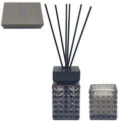 Enhance your space with the delightful aroma of this candle and diffuser set.