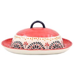 a colourful patterned butter dish
