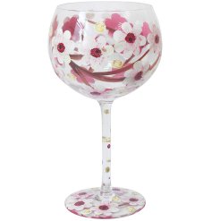 A delightful gin glass shaped like a balloon for a unique drinking experience.