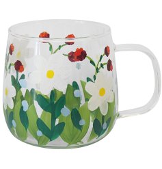 add a spring vive to your coffee with this daises glass mug 