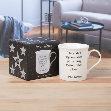 Celebrate John Lennon’s timeless words daily with this elegant white ceramic mug