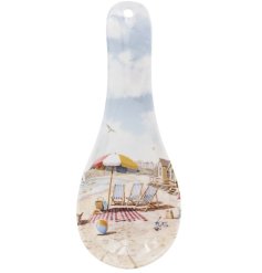 Keep your kitchen neat and organized with the Sandy Beach Spoon Rest.