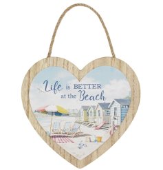 Bring coastal charm home with the Sandy Beach Heart Plaque.