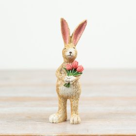 Bring spring charm to your space with this cute Rabbit and Tulip decorative figurine.
