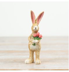 Bring spring cheer to your space with this cute Rabbit holding a tulip figurine.