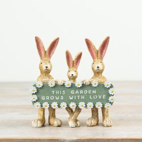 Charming rabbit family ornament: This garden blooms with love and warmth.