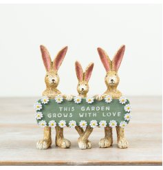 Charming rabbit family ornament that grows love in your garden.