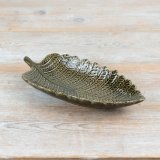 Add a fresh, natural touch to your space with this elegant leaf dish