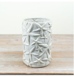 A gorgeous Starfish vase in a natural colour tone finished with a clear glaze.