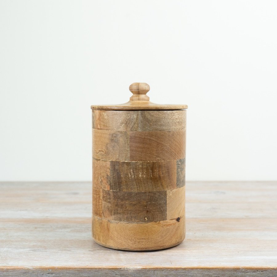 Chic round container with a secure lid for easy storage.