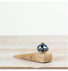 Chic ceramic doorstop for a sleek, functional touch to any room.