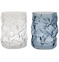 Add coastal charm to your space with this Starfish embosses vase