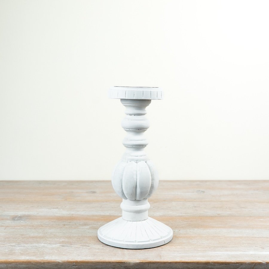 A delightful rustic candle holder with a soothing whitewashed finish, ideal for a warm, welcoming vibe