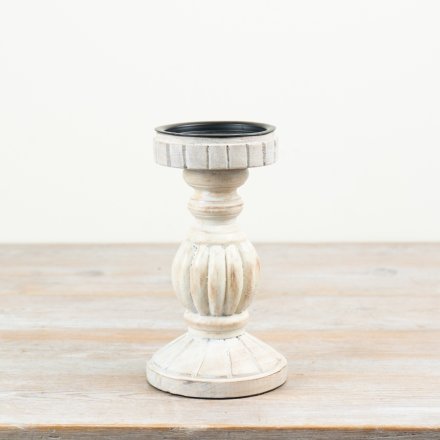 Elegant white candle holder for a chic and modern touch.