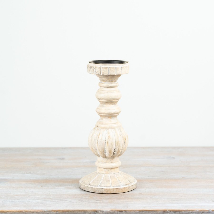 Tall whitewashed candlestick with a rustic finish, perfect for adding charm to any space.