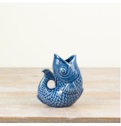 Beautiful blue fish-shaped vase with vibrant color and elegant design.