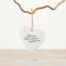 Heartfelt heart decor with a loving slogan, perfect for your special nanny.
