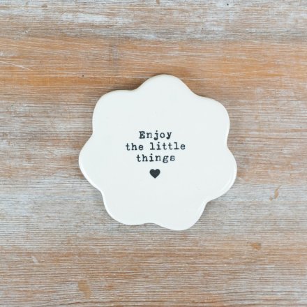 Savor small moments with this stylish porcelain flower coaster.