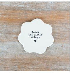 Savor small moments with this stylish porcelain flower coaster.