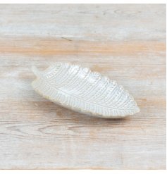 Chic leaf-patterned dish perfect for holding small treasures.