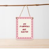 A fun and eye-catching sign that brings a splash of colour and humour to any room.