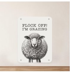 Metal sign featuring an adorable sheep design with charming appeal.