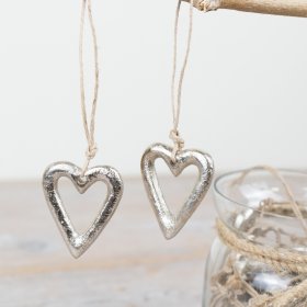 Silver-tone heart charm suspended on natural jute twine.