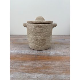 Add a chic touch to your living area with this stylish stone-textured decorative pot.