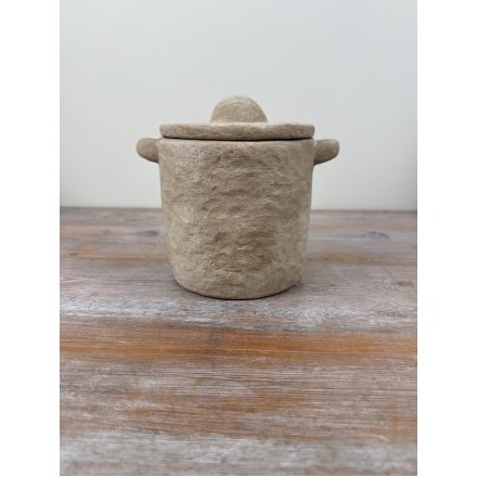 Create a simple yet stylish atmosphere in the living space with this chic stone textured pot