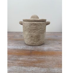 Create a simple yet stylish atmosphere in the living space with this chic stone textured pot