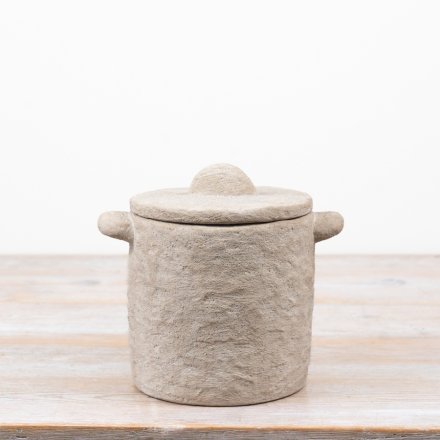 Create a simple yet stylish atmosphere in the living space with this chic stone textured pot