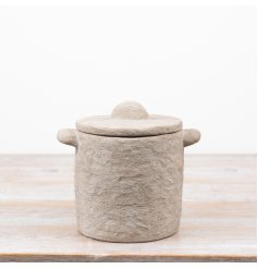 Create a simple yet stylish atmosphere in the living space with this chic stone textured pot