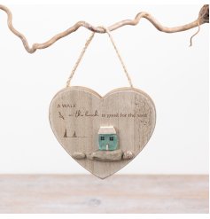 Add a charming coastal touch to your home with this heart-shaped hanging decoration