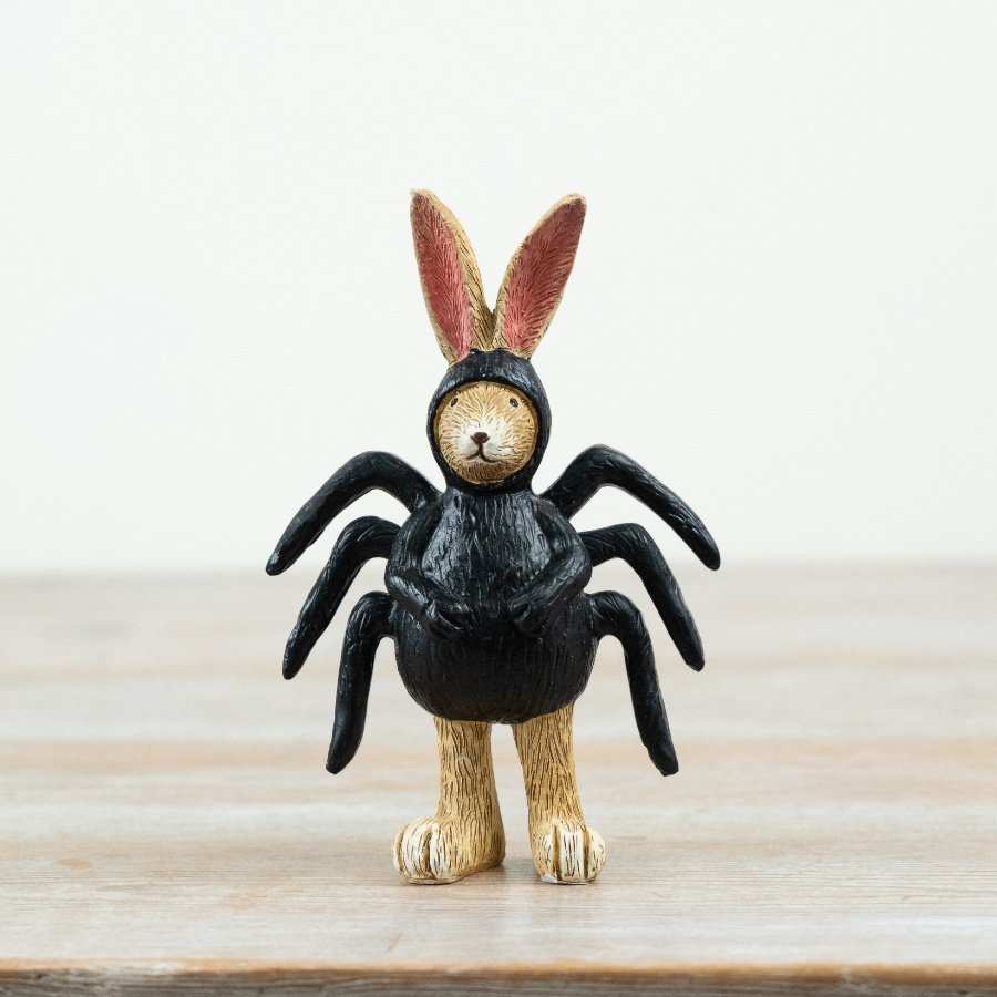 Charming polyresin figurine combining rabbit features with unique spider-inspired details.