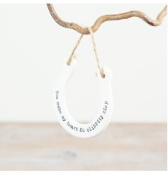 Add a charming touch to your home with this delicate porcelain hanging hoof